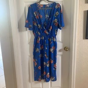 Capri cut floral romper XL. Elastic waist with belt to fit smaller or larger.
